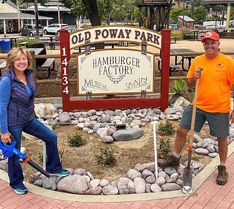 Donna Kaptain and Scott Angeli in front of Old Poway Park sign