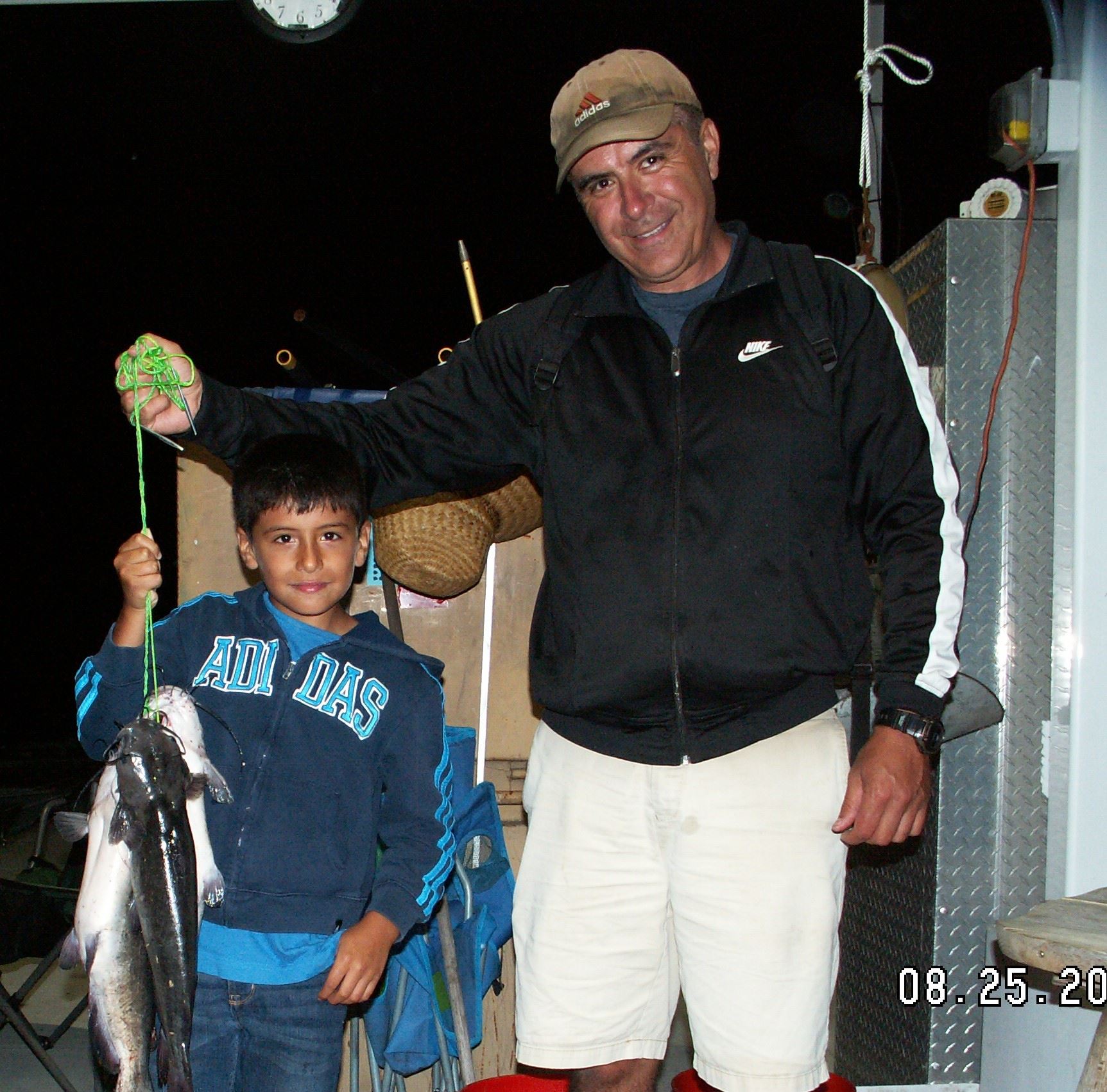 Anres and Martin Enriquez, fisrst cat for boy, 25 Aug 17, 8lbs total Fishing Pier, hot dog